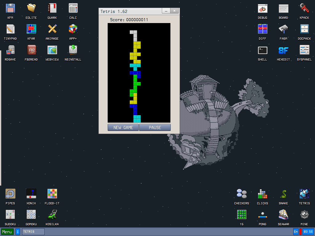 The KolibriOS desktop running in a virtual machine, with a game of Tetris in progress, captured from the guest framebuffer.